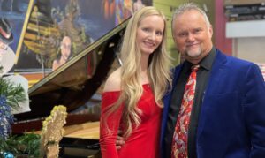 Garry & his daughter Holly playing Christmas piano at Gentry Music & Arts